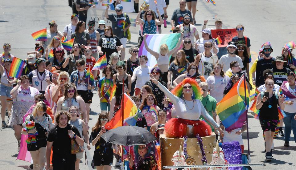 The Erie Pride Parade and Festival moves north in the 1400 block of State Street in Erie on Saturday.