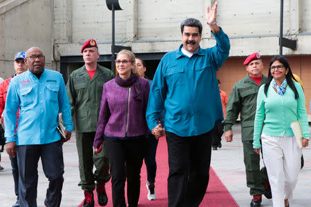 Venezuela's President Nicolas Maduro and his wife Cilia Flores, attend a meeting with supporters in Caracas, Venezuela January 22, 2019. Miraflores Palace/Handout via REUTERS