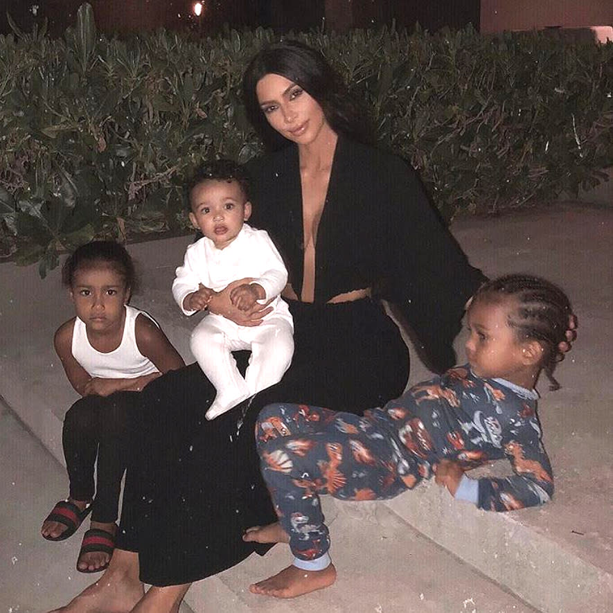 Kim Kardashian and her three kids