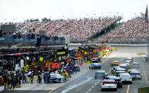 BROOKLYN, MI - JUNE 17: Cars pit during the NASCAR Sprint Cup Series Quicken Loans 400 at Michigan International Speedway on June 17, 2012 in Brooklyn, Michigan. (Photo by Jared C. Tilton/Getty Images)