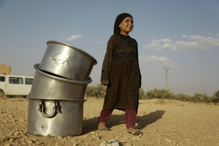 An Syrian girl in Manbij on June 23, 2016, where IS group fighters are accused of using civilians as human shields