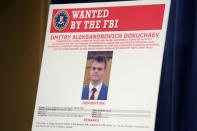 A poster of suspected Russian hacker is seen before FBI National Security Division and the U.S. Attorney's Office for the Northern District of California joint news conference at the Justice Department in Washington, U.S., March 15, 2017. REUTERS/Yuri Gripas