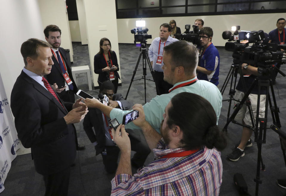 Ohio Democratic gubernatorial candidate Richard Cordray, left, is photographed in the spin room following a debate against Ohio Attorney General and Republican gubernatorial candidate Mike DeWine at the University of Dayton Wednesday, Sept. 19, 2018, in Dayton, Ohio. (AP Photo/Gary Landers)