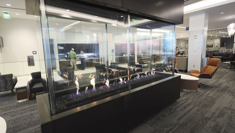 Passengers wait in the Delta Sky Club during the first phase opening of the new Salt Lake City International Airport in Salt Lake City on Tuesday, Sept. 15, 2020.