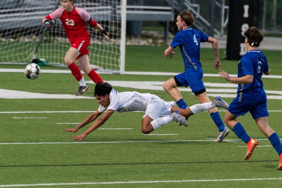 Georgetown's Martin Valdes draws a foul near the end of Thursday night's Class 5A bi-district playoff against McCallum. With four seconds left, Valdes converted the penalty shot to tie the score, and the Eagles prevailed 3-1 in extra time.