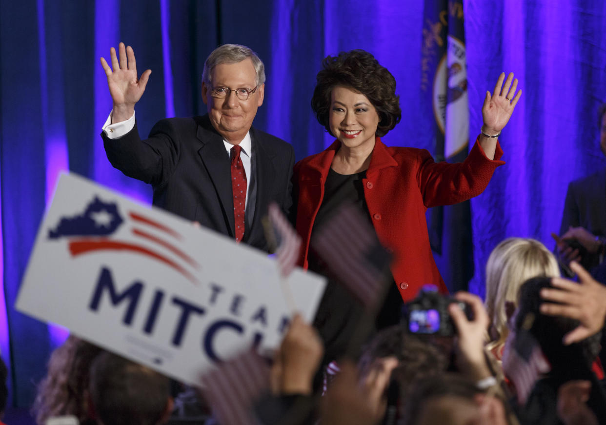 Senate Minority Leader Mitch McConnell of Ky.,  joined by his wife, former Labor Secretary Elaine Chao, celebrates with his supporters at an election night party in Louisville, Ky.,Tuesday, Nov. 4, 2014. (Photo: J. Scott Applewhite/AP)