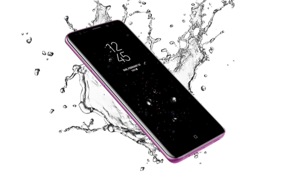 The Samsung S9 is pictured with splashing water around it and a white background for an ad