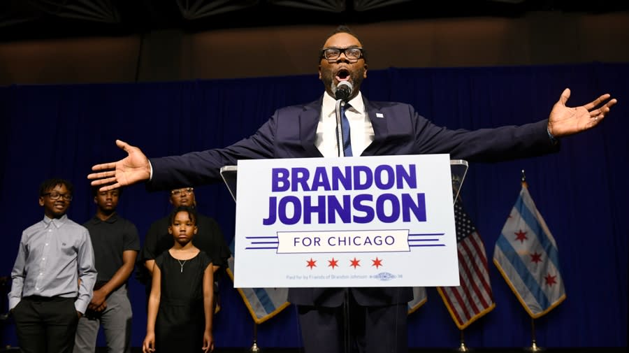 Chicago Mayor-elect Brandon Johnson celebrates with supporters after defeating Paul Vallas