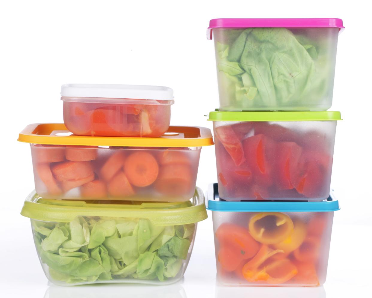 different plastic boxes for storage with vegetables