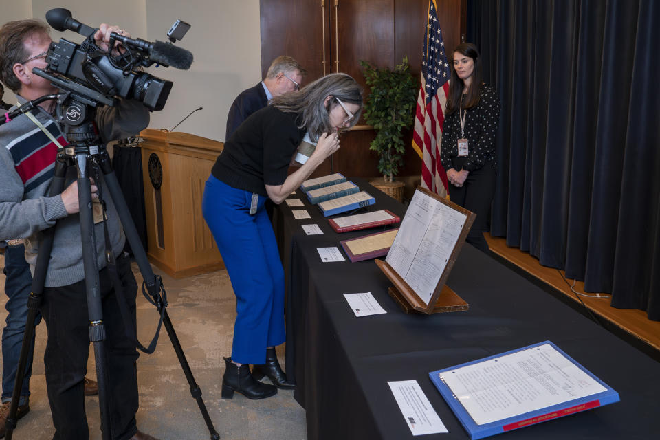 Reporters preview a selection of papers of the late Supreme Court Justice John Paul Stevens that will be made available to researchers, at the Library of Congress, in Washington, Monday, May 1, 2023. (AP Photo/J. Scott Applewhite)