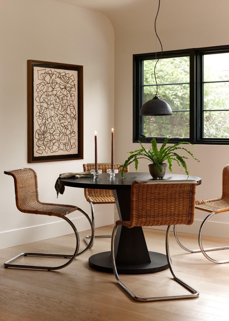 Why go to the dining room when you have a breakfast nook close by? It’s a question Alex and Aaron never fail to ask—and answer—on Sundays, when time is aplenty. The MR Side Chairs by Knoll from Design Within Reach and vintage Brancusi table look like they could have been there all along.