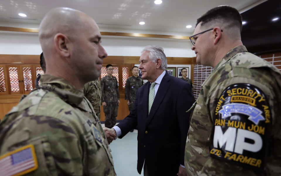 <p> U.S. Secretary of State Rex Tillerson, center, meets with U.S. and South Korea soldiers before the lunch meeting at the Camp Bonifas near the border village of Panmunjom, which has separated the two Koreas since the Korean War, in Paju, South Korea, Friday, March 17, 2017. (AP Photo/Lee Jin-man, Pool) </p>