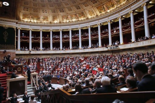 French Prime Minister Jean-Marc Ayrault addresses Members of Parliament at the National Assembly in Paris. Ayrault on Tuesday urged the French to rally behind efforts to tackle a "crushing" debt burden after an audit warned of a 43-billion-euro budget hole