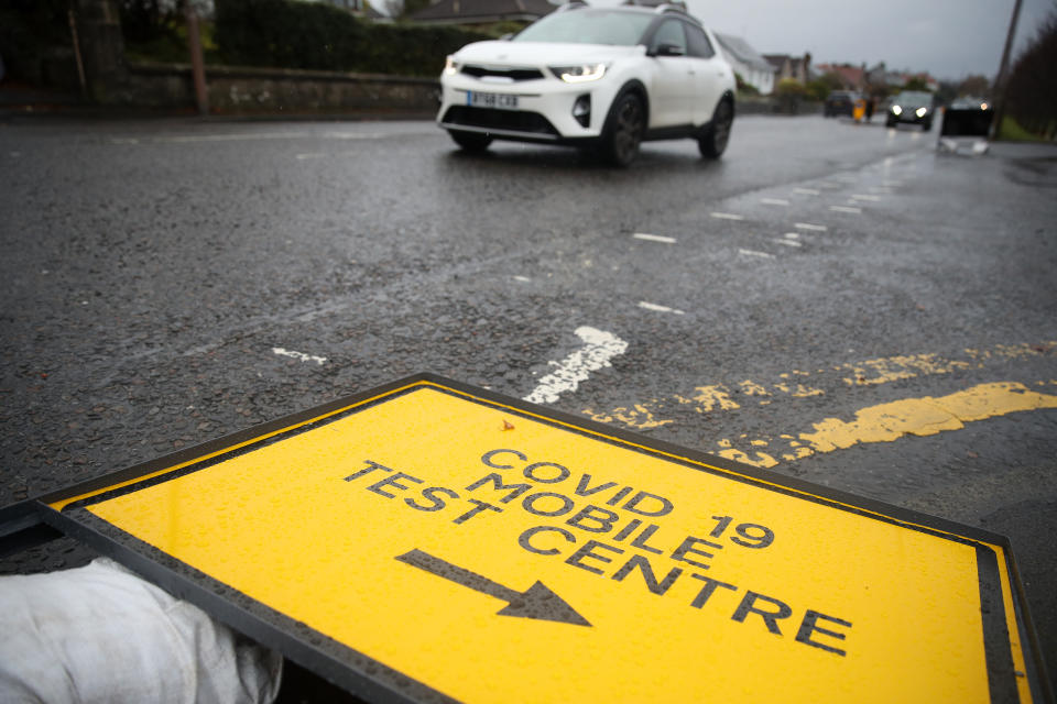 A general view of a Covid-19 mobile test centre sign at the entrance to Bannockburn High School near Stirling. Scotland is currently using a tier system to try and drive down coronavirus cases.