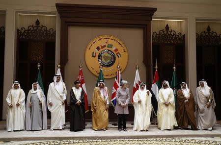 Britain's Prime Minister Theresa May joins other leaders for a family photo at the Gulf Cooperation Council (GCC) Summit in Manama, Bahrain December 7, 2016. REUTERS/Stefan Wermuth