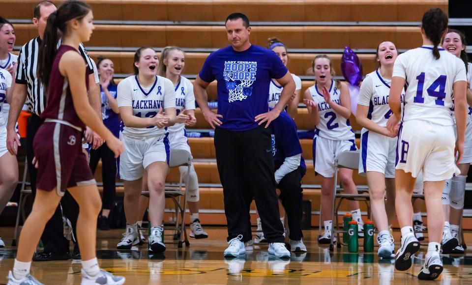 Blackhawk girls basketball coach Steve Lodovico tries to keep his emotions in check following the Cougars win over Beaver 72-51 Thursday at Blackhawk High School. It was a year ago to the day that his dad died. [Lucy Schaly/For BCT]