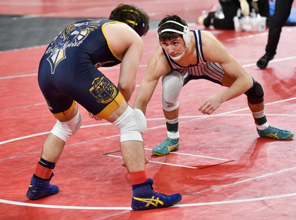 St. Augustine's Richie Grungo, right, defeated Holy Spirit's Ken Sherman 9-5 following Friday's 144-pound quarterfinal wrestling bout at Boardwalk Hall in Atlantic City, N.J. March 4, 2022.