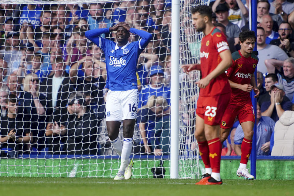 Everton's Abdoulaye Doucoure reacts after a missed effort , during the English Premier League soccer match between Everton and Wolverhampton Wanderers, at Goodison Park, in Liverpool, England, Saturday, Aug. 26, 2023. (Peter Byrne/PA via AP)