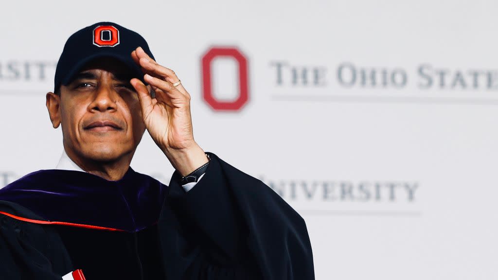 Barack Obama dons an Ohio State University cap