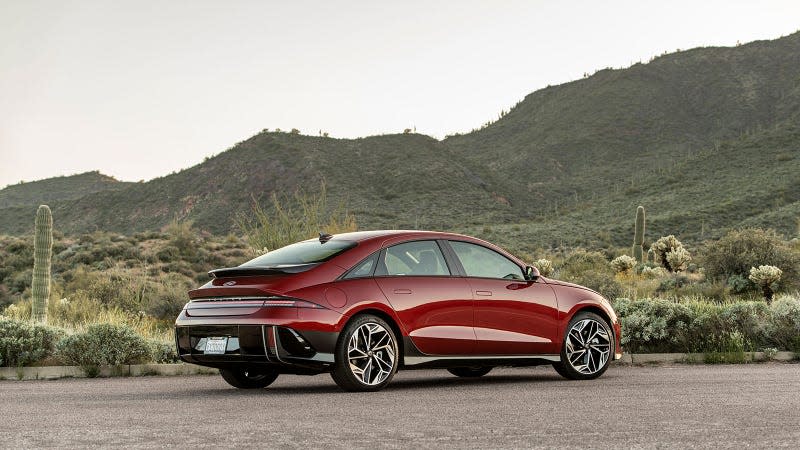 A photo of a red Hyundai Ioniq 6 sedan. 