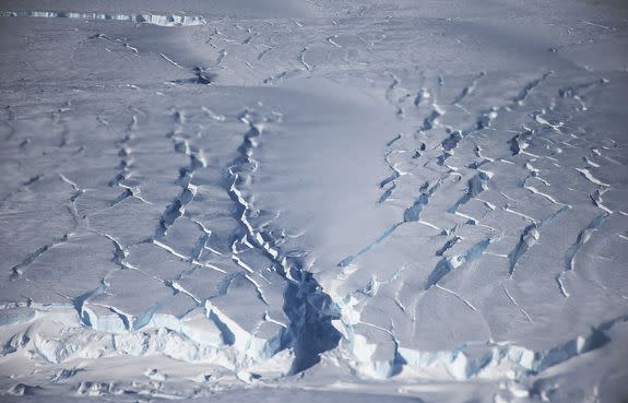 Ice crevasses near the coast of West Antarctica from a window of a NASA Operation IceBridge airplane, Oct. 28, 2016.