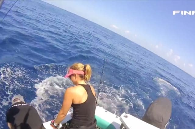 Fisherman struggles with marlin