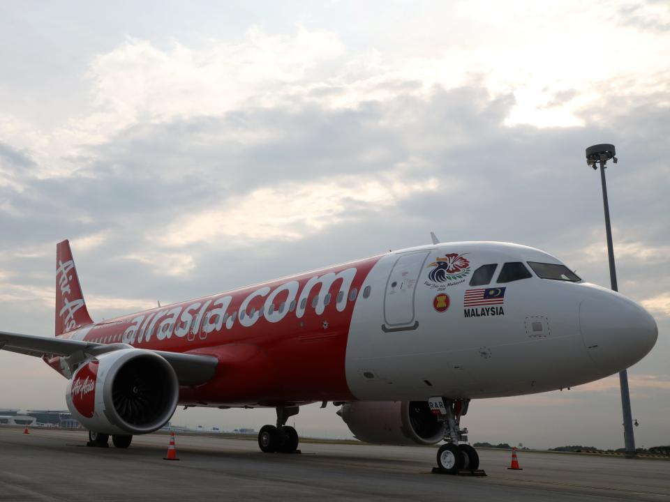 FILE PHOTO: An AirAsia Airbus A320-200 plane is pictured at Kuala Lumpur International Airport in Sepang, Malaysia, July 22, 2019. REUTERS/Lim Huey Teng