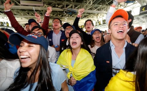 Followers of presidential candidate Duque celebrate his victory in the second round of the presidential election in Bogota - Credit: Reuters