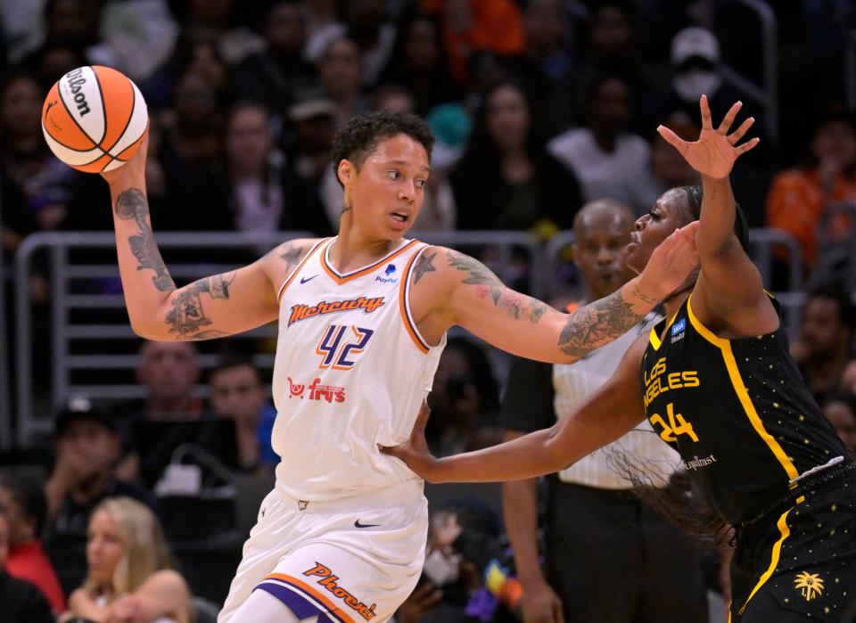 May 19, 2023; Los Angeles, California, USA;  Phoenix Mercury center Brittney Griner (42) is defended by Los Angeles Sparks forward Joyner Holmes (24) in the first half at Crypto.com Arena. Mandatory Credit: Jayne Kamin-Oncea-USA TODAY Sports