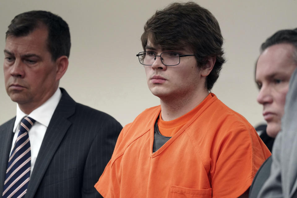 FILE - Payton Gendron, center, listens as he is sentenced to life in prison without parole for domestic terrorism motivated by hate and each of the 10 counts of first-degree murder, in an Erie County court room, in Buffalo, N.Y., Feb 15, 2023. Federal prosecutors will seek the death penalty against Gendron, they said in a court filing Friday, Jan. 12, 2024..(Derek Gee/The Buffalo News via AP, Pool, File)