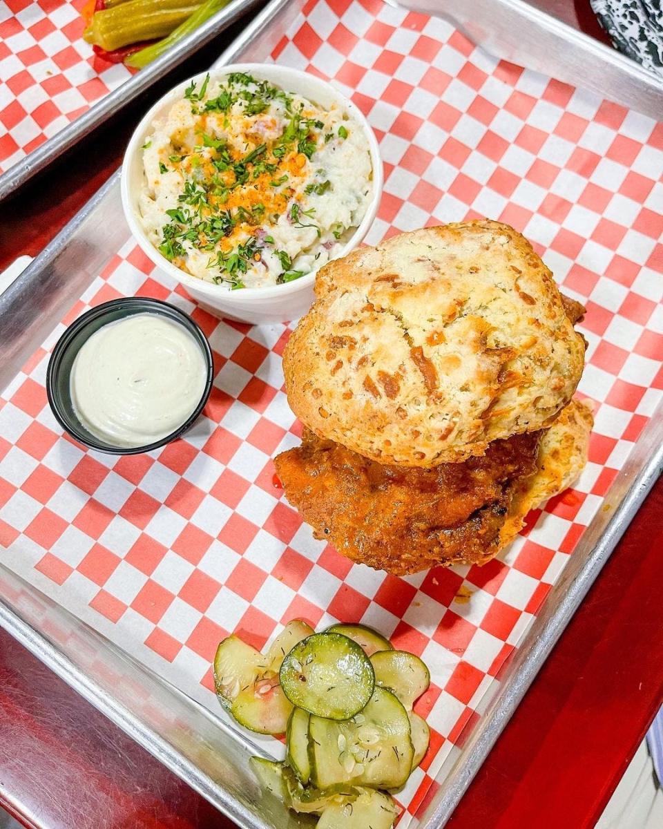 Among the signature dishes at Kenny Gilbert's Silkies is the Flavor Bomb, a smokey fried chicken thigh, a truffle gouda drop biscuit, orange blossom honey and Fernandina Beach Hot Sauce.