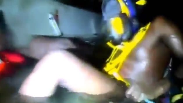 Harrison was winched from the sunken boat to safety. Photo: YouTube.