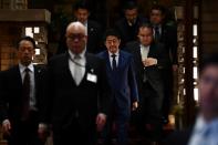 Japan's Prime Minister Shinzo Abe talks to the journalists in front of the prime minister's residence in Tokyo