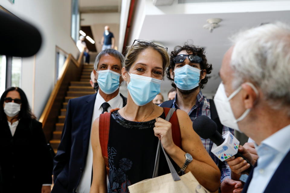 Aya Biran, the paternal aunt of Eitan Biran, a six-year-old boy who was the only survivor of an Italian cable car disaster and is now at the centre of a custody battle, speaks to members of the media before the start of a court hearing over the alleged kidnapping of Biran at a court in Tel Aviv, Israel September 23, 2021. REUTERS/Corinna Kern