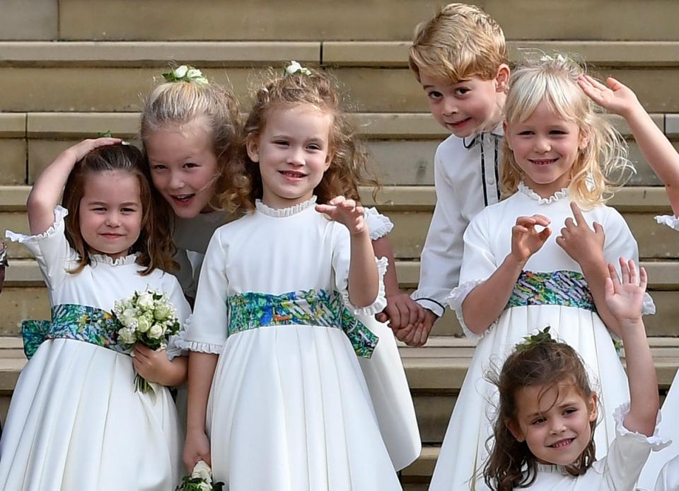 Princess Charlotte of Cambridge, Savannah Phillips, Maud Windsor, Prince George of Cambridge, Isla Phillips, Theodora Williams, and Mia Tindall at Princess Eugenie’s wedding in  2018 (Toby Melville/WPA Pool/Getty Images)