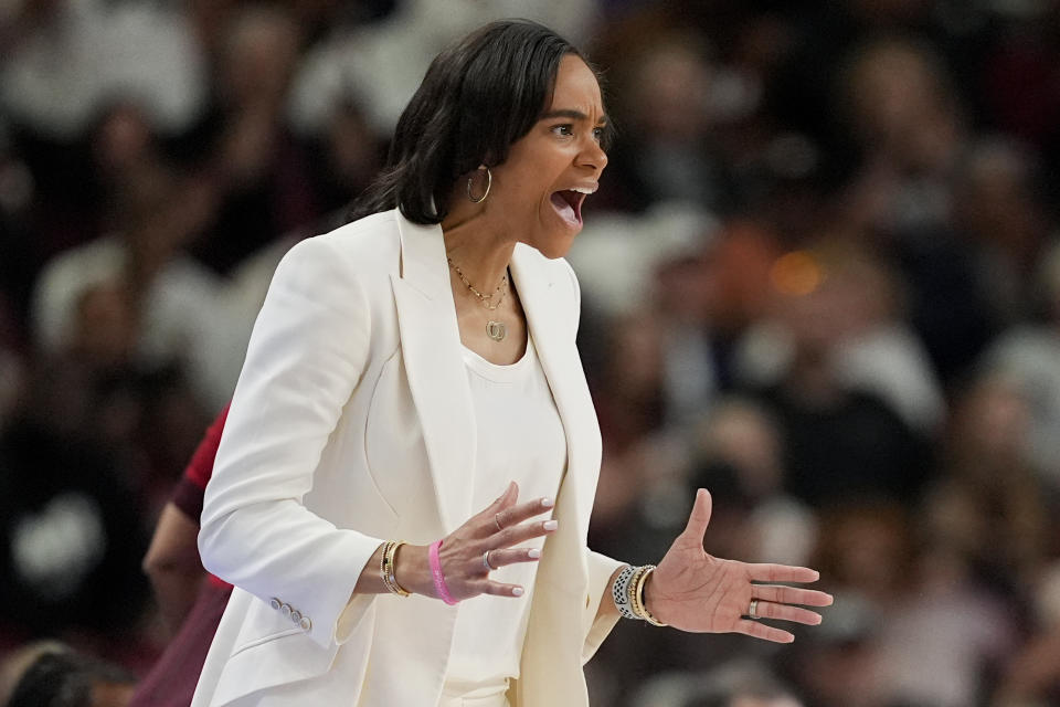 Texas A&M head coach Joni Taylor yell during the second half of an NCAA college basketball game against South Carolina at the Southeastern Conference women's tournament Friday, March 8, 2024, in Greenville, S.C. (AP Photo/Chris Carlson)