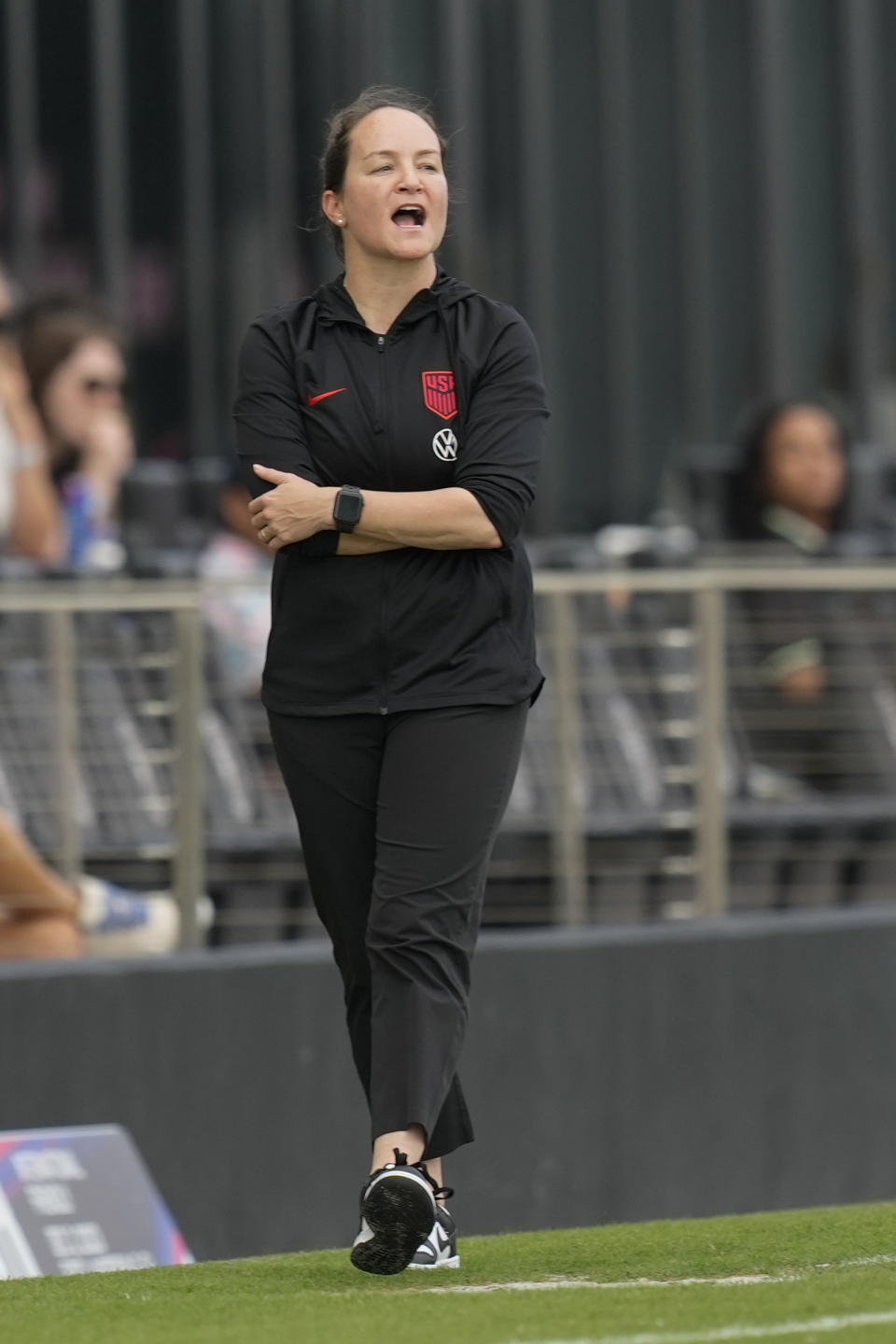United States interim head coach Twila Kilgore calls to her players from the sideline during the first half of a women's International friendly soccer match against China in Fort Lauderdale, Fla., Saturday, Dec. 2, 2023. (AP Photo/Rebecca Blackwell)