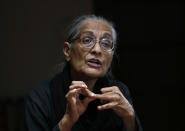 Pakistan's prominent rights activist Tahira Abdullah speaks about violence against women during an interview with The Associated Press in Islamabad, Pakistan, Tuesday, July 27, 2021. The beheading of a young woman in an upscale neighborhood of Pakistan's capital has shone a spotlight on the relentless violence against women in the country. Rights activists say such gender-based assaults are on the rise as Pakistan barrels toward greater religious extremism. (AP Photo/Anjum Naveed)