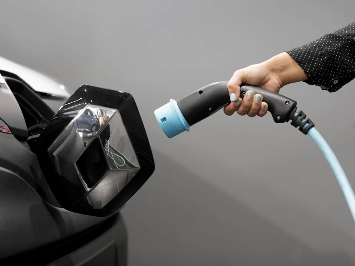 Automotive industry analysts say rising gas prices have more consumers looking into electric vehicles.  (Eric Gaillard/Reuters - image credit)