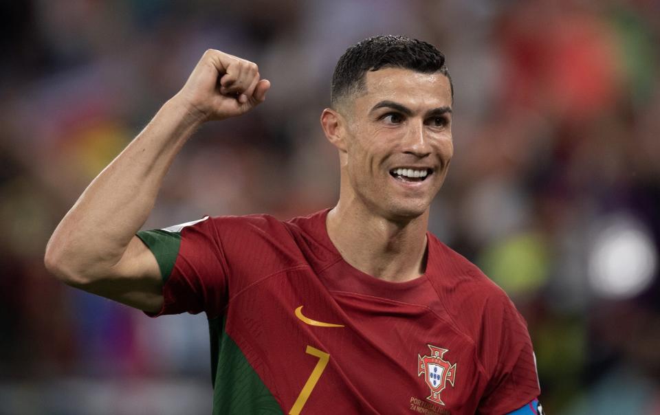 Cristiano Ronaldo celebrates as JoÃ£o FÃ©lix scores for Portugal during the FIFA World Cup Qatar 2022 Group H match between Portugal and Ghana at Stadium 974 on November 24, 2022 in Doha, Qatar. - Visionhaus//Getty Images