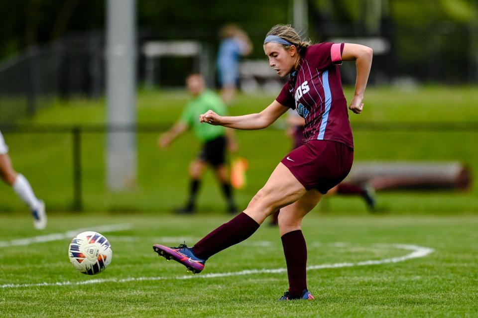 Okemos' Ella Antcliff attempts to score against DeWitt during the second half on Tuesday, May 16, 2023, at Okemos High School.