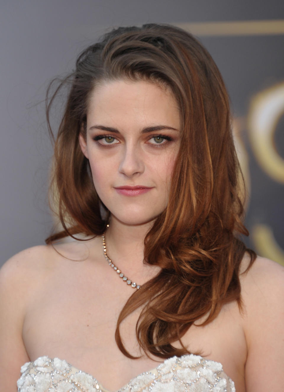 Actress Kristen Stewart arrives at the Oscars at the Dolby Theatre on Sunday Feb. 24, 2013, in Los Angeles. (Photo by John Shearer/Invision/AP)