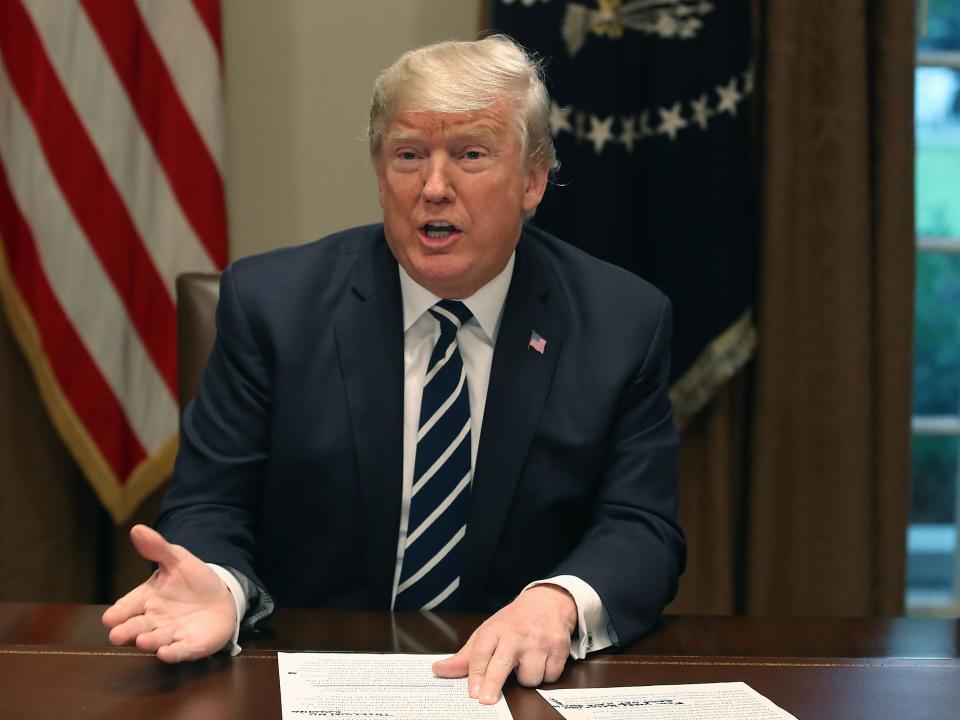 U.S. President Donald Trump talks about his meeting with Russian President Vladimir Putin, during a meeting with House Republicans in the Cabinet Room of the White House on July 17, 2018 in Washington, DC.