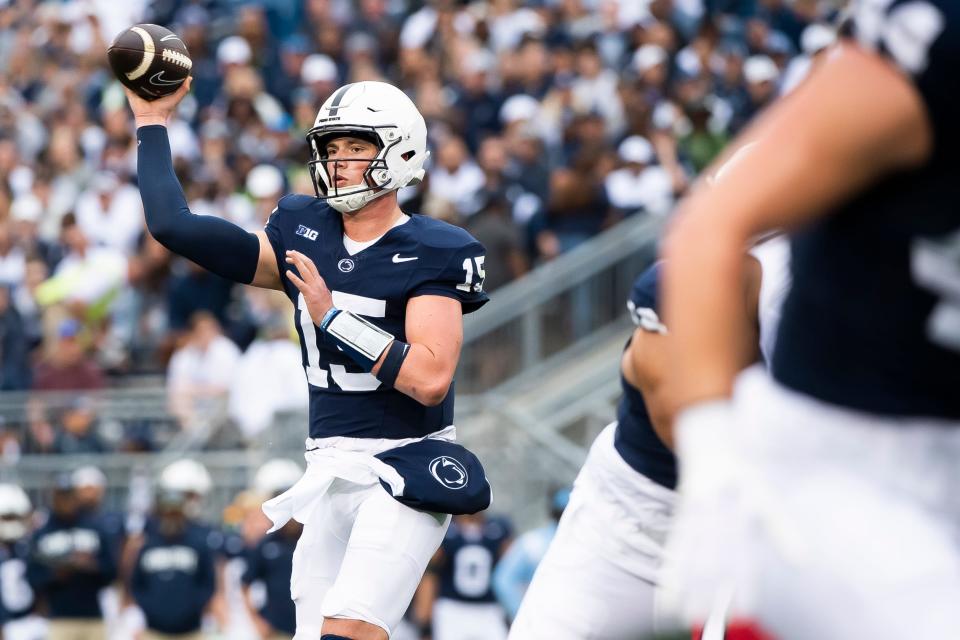 Penn State quarterback Drew Allar (15) throws a screen pass in the first half of an NCAA football game against Indiana at Beaver Stadium Saturday, Oct. 28, 2023, in State College, Pa. The Nittany Lions won, 33-24.