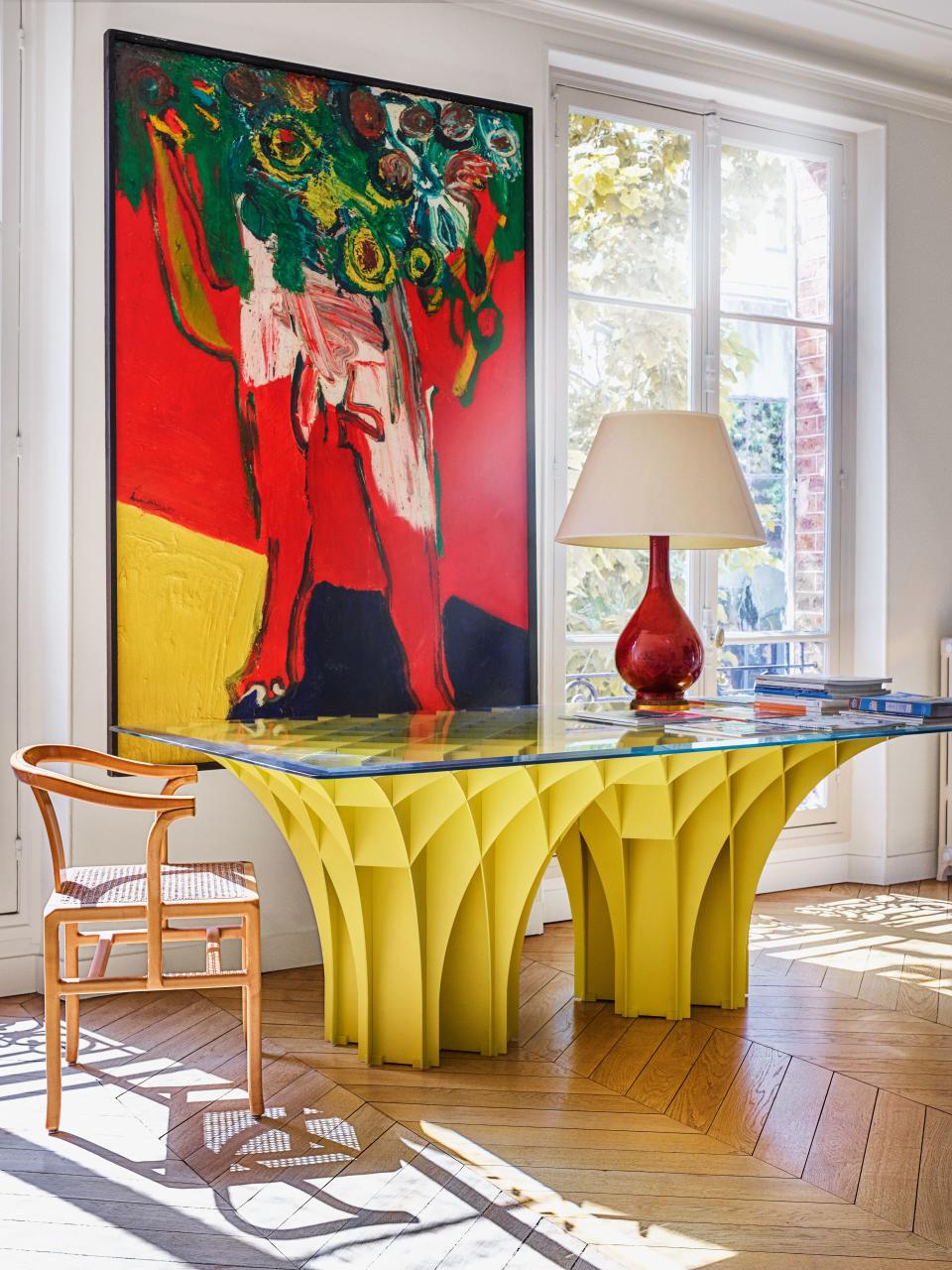 A Double Cathedral table by Paulin.