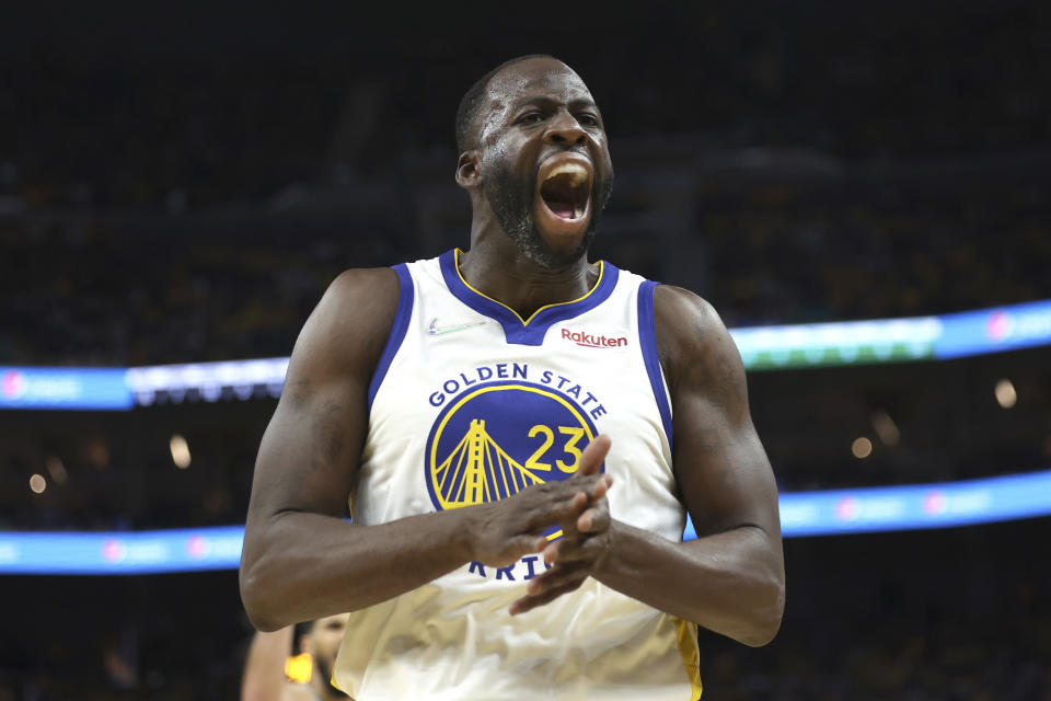 Golden State Warriors forward Draymond Green (23) reacts during the second half of Game 1 of basketball's NBA Finals against the Boston Celtics in San Francisco, Thursday, June 2, 2022. (AP Photo/Jed Jacobsohn)