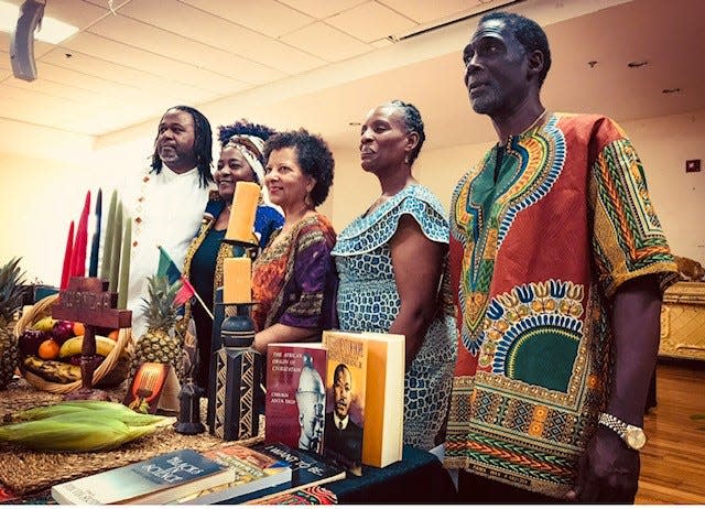 Several of the original members of the Nguzu Saba Collective that organized Kwanzaa celebrations in Brevard. Far Left, Nate and Michelle Davis, Patricia Davis, Albert Clinkscale, and Earl Simmons.