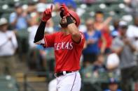 Aug 8, 2018; Arlington, TX, USA; Texas Rangers third baseman Joey Gallo (13) crosses home plate after hitting a home run during the third inning against the Seattle Mariners at Globe Life Park in Arlington. Shanna Lockwood-USA TODAY Sports