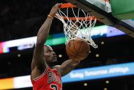 Chicago Bulls' Javonte Green dunks during the first half of an NBA basketball game against the Boston Celtics, Monday, Nov. 1, 2021, in Boston. (AP Photo/Michael Dwyer)