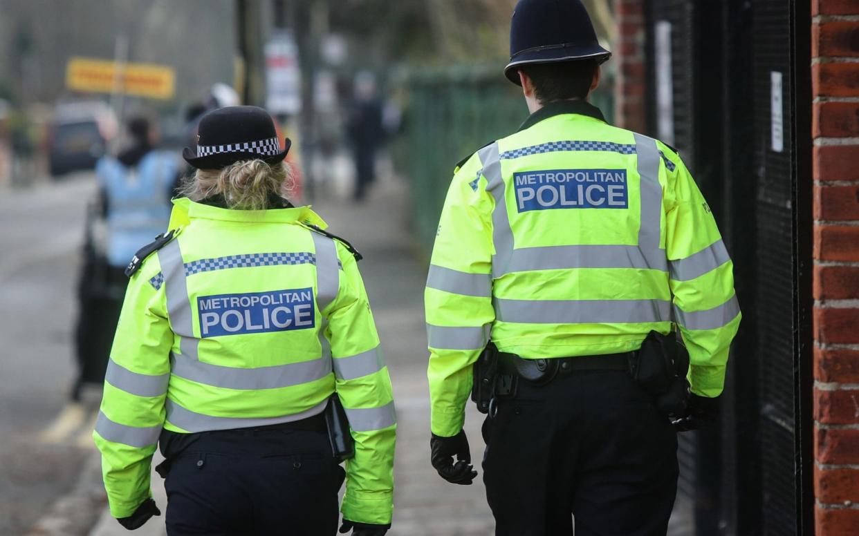 Metropolitan Police officers walking a beat on patrol in Fulham, London  - Britpix / Alamy Stock Photo 